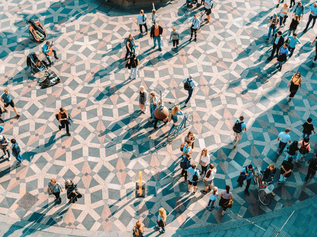 JJ Photo Aerial View Of People Walking In City Square Gettyimages 1156746973 4Star (1)